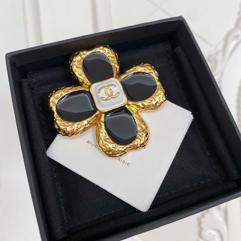 Ch*el brooches